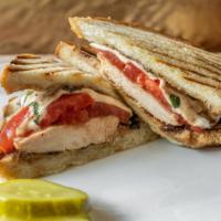 Chicken Caprese Panini Grilled Chicken · Tomato, basil and fresh mozzarella. Served on ciabatta bread with a side of french fries and...