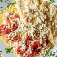 Chicken Alla Mia · Sautéed chicken breast with roasted peppers in a lemon butter white wine sauce. Topped with ...