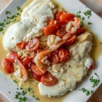 Chicken And Shrimp Sofia · Sautéed chicken breast with shrimp in garlic and olive oil with chopped tomatoes in white wi...
