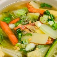 Tofu & Mixed Vegetables Soup · A good complement to any meal, this light chicken broth soup is prepared with mixed vegetabl...