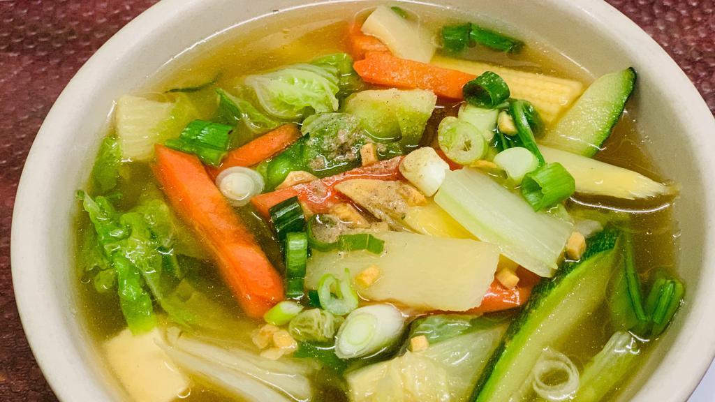 Tofu & Mixed Vegetables Soup · A good complement to any meal, this light chicken broth soup is prepared with mixed vegetables and soft tofu.