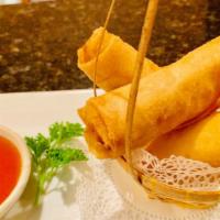 Golden Spring Roll · Three pieces. A classic starter, our crispy vegetable rolls are filled with celery, carrots,...