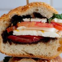 Lg Caprese · Thick Sliced Beefsteak tomatoes, wedges of fresh mozzarella, fresh basil drizzled with balsa...