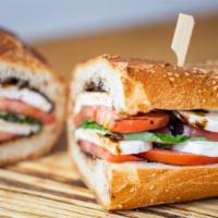 Sm Caprese · Thick Sliced Beefsteak tomatoes, wedges of fresh mozzarella, fresh basil drizzled with balsa...