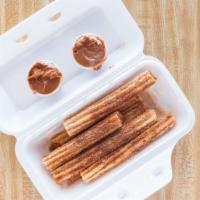 Churros (Large) · 3 Churros with cinnamon and sugar.  With Dulce de leche for an extra charge.