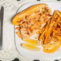 Salmon Cheesesteak · Salmon cooked with sautéed mixed peppers, onions, broccoli and cheese on a soft roll with se...