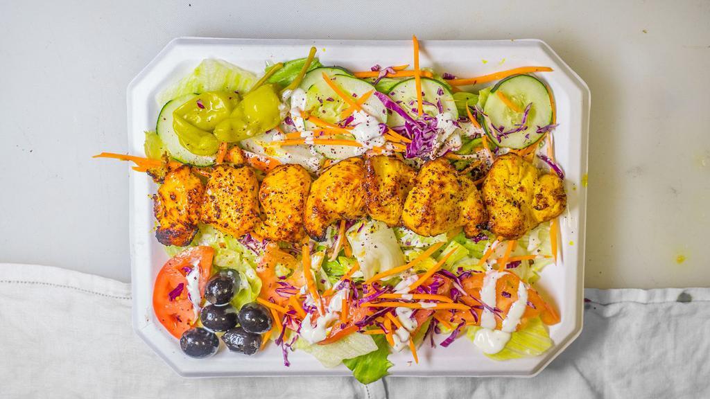 Chicken Kabob Salad · Comes with lettuce, tomato, and cucumber along with special white sauce dressing. Salads include bread and chick peas.