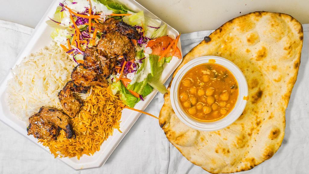 Beef Kabob Platter · Includes basmati rice (white and brown), salad, fresh tandoori bread, side of chick peas, one white sauce, and one spicy sauce.