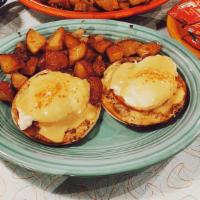 Classic Benny · 2 poached eggs, canadian bacon, english muffin, hollandaise sauce