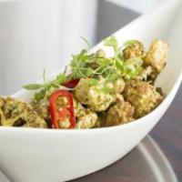 Curried Cauliflower · Spiced cashews, madras curry