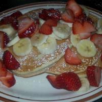 3 Short Stack Of Hot Cakes · Fresh melted butter and syrup, chocolate chips, or with 2 eggs. Add fruit for an additional ...