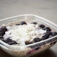 Chia Pudding · Almond milk, chia seeds, agave, spices. Topped with berries and coconut.