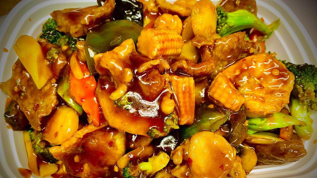 Triple Delight · Shrimp beef chicken with mix veggies in spicy brown sauce.