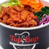 Spicy Pork Bop · Spicy marinated pork, rice, lettuce, broccoli, carrot, red cabbage. Default Sauce: None