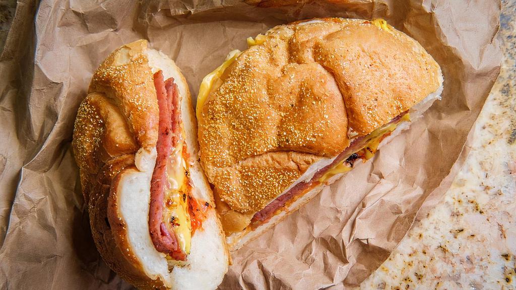 Ham, Egg & Cheese  · Delicious Ham 2 scrambled Eggs and Cheese on a roll or bagel. Liscio's bakery Roll and Bagels Made Fresh Daily. Topped the way you like.