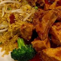 General Gau'S Chicken · Served with your choice of appetizer and rice. Spicy.