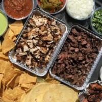 Taco Platter · Serves 3-4. Everything you need to build-your-own Tacos. Includes Flour Tortillas, Grilled C...