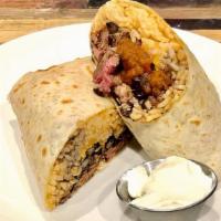Burrito · Flour Tortilla filled with Spanish Rice, Black Beans, Cheese, Salsa, Sour Cream, and Your Ch...