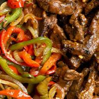 Brisket Fajitas · Hand-cut strips of brisket simmered with fresh onions and peppers in a traditional fajita sa...