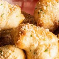 Garlic Bites · Dippable pieces of New York-style dough smothered in garlic and butter. The perfect side dis...