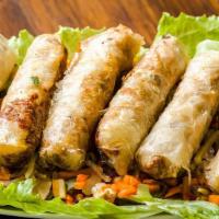 Gỏi Cuốn Thịt Nướng / Grilled Pork Summer Rolls · Grilled pork, lettuce, vermicelli noodles and mint wrap in rice paper, served with house spe...