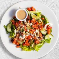 Meet And Greek Salad  · (Vegetarian) Romaine lettuce, cucumbers, tomatoes, red onions, olives, and feta cheese tosse...