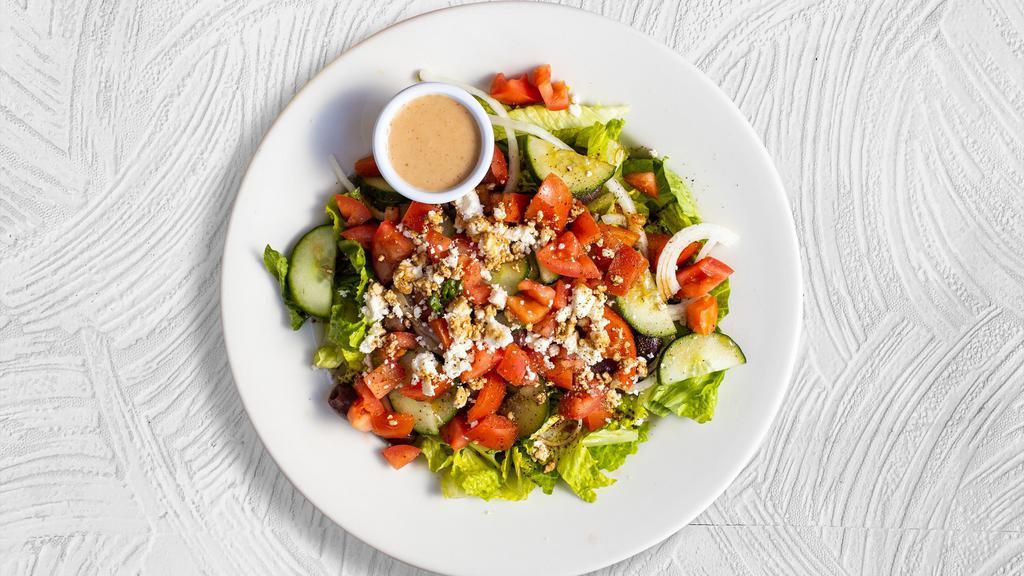 Meet And Greek Salad  · (Vegetarian) Romaine lettuce, cucumbers, tomatoes, red onions, olives, and feta cheese tossed with balsamic vinaigrette dressing.
