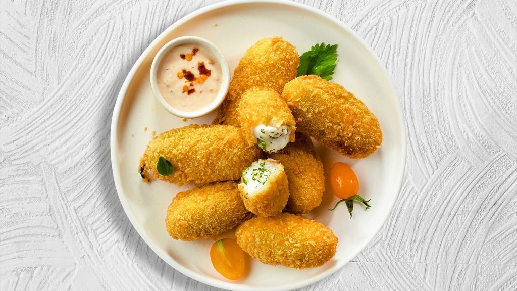 Jalla Heat Popper  · (Vegetarian) Fresh jalapenos coated in cream cheese and fried until golden brown.