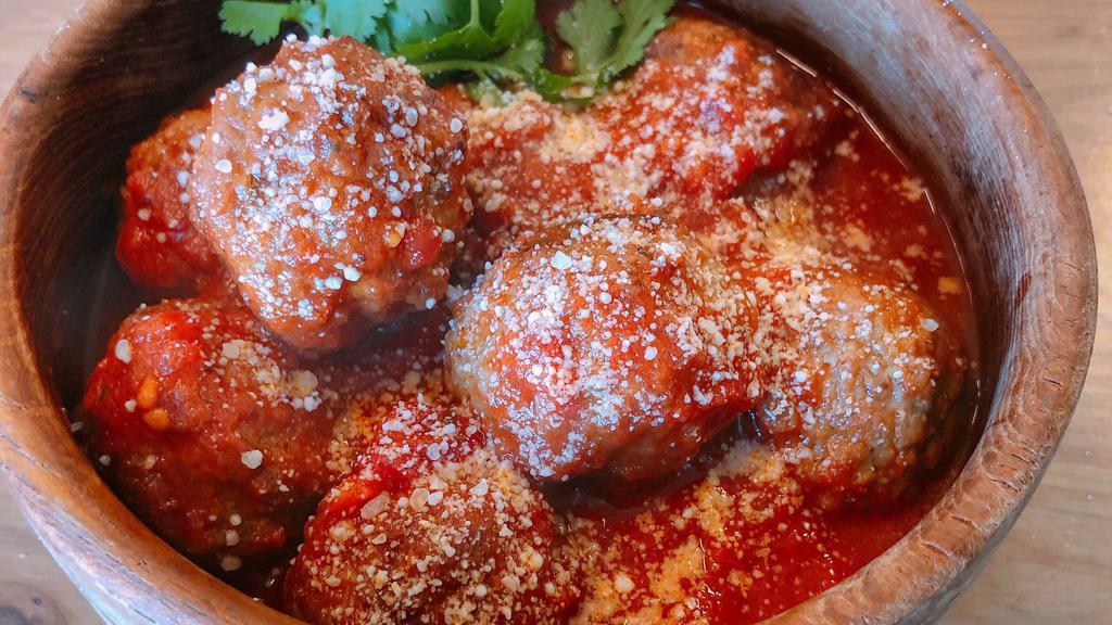 Meatballs · Served with marinara sauce.