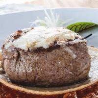 Filete Toluca · 8 oz Center cut filet mignon, melted chihuahua cheese. Smothered with a smoky chipotle-chori...