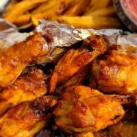 50 Wings & Fries · 50 Jumbo chicken wings served with fries, celery sticks, and dipping sauce (blue cheese / ra...