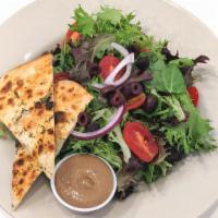 House Salad · Mixed greens, tomato, olives, red onion, house-made balsamic vinaigrette, focaccia