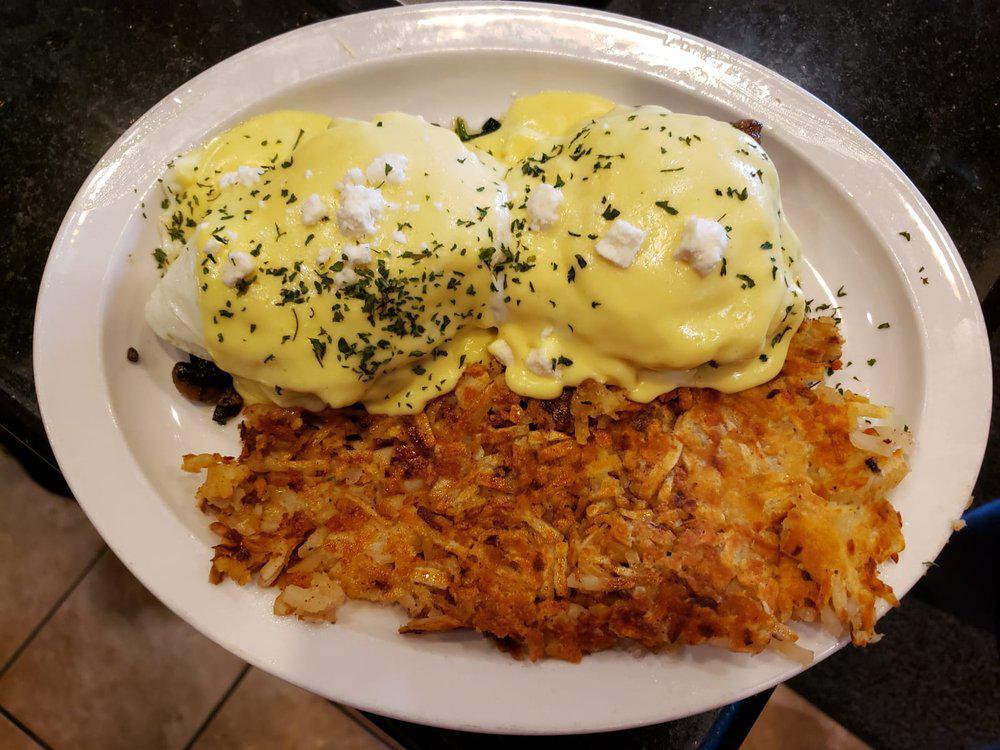World Of Omelettes & Waffles · Breakfast · American · Sandwiches · Desserts