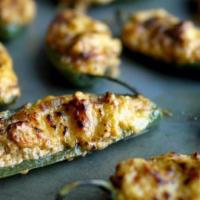 Stuffed Jalapenos · Stuffed with creamy cheese blend and cooked to perfection.