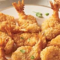 Butterfly Shrimp · Six breaded and deep fried butterflied shrimp. Served with cocktail sauce.