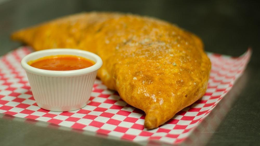 Meat Lovers Calzone · Cheese with ham, pepperoni, sausage, bacon and beef.