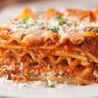 Lasagna · Meat sauce and cheese on a layer of tender pasta.