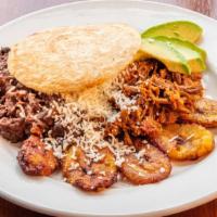 Pabellon Arepa · Stewed shredded beef or stewed shredded chicken, black beans, white Spanish cheese and avoca...