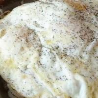 Carnita Skillets · Our skillets are mixed with shredded cheese and topped with two eggs any style. Choice of bu...