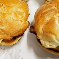 Bacon, Egg & Cheese · Served on a roll with whole wheat toast and choice of french fries or maduros (fried sweet p...
