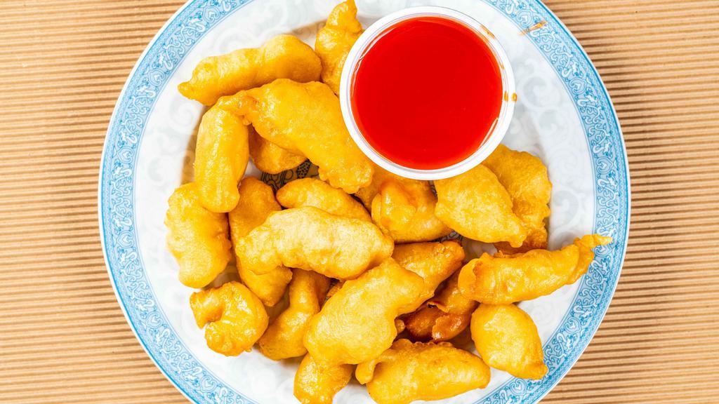 Sweet & Sour Chicken · Fried crispy breaded chicken that comes with a sweet dipping sauce.