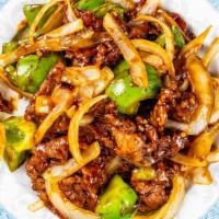 Pepper Steak With Onion · Stir fried steak with vegetables and a savory sauce.