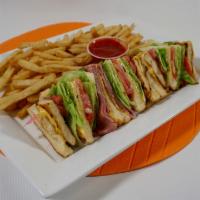 Club Sandwich · Classic club sandwich with chicken and ham, American cheese, lettuce, tomato and mayonnaise ...