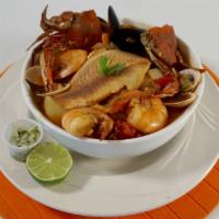 Seafood Soup · A delightful combination of shrimp, mussels, clams, crab shell  and fish (tilapia).