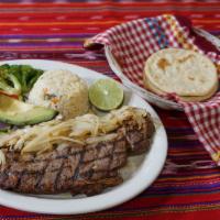 Rib Eye Steak · A great portion of rib eye steak with salad, vegetables, rice and pico de gallo. Served with...