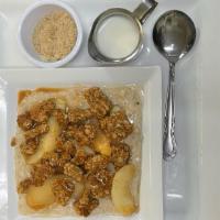 Apple Cobbler Oatmeal · Oatmeal topped apples, cinnamon, sugar and butter. Topped with granola, agave syrup.
