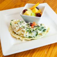Mini Mediterranean Omelet · An *egg white omelet filled with fresh spinach, tomatoes, artichokes, kalamata olives and fe...