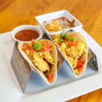M. Chorizo Tacos · Two corn tortillas filled with scrambled *eggs, *chorizo, onions, green chiles, Cheddar Jack...