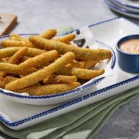 New! Crispy Green Beans · Crispy battered green beans served with jalapeño ranch.. 720 Cal