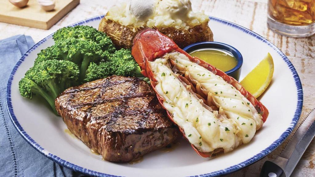 Surf & Turf Maine Lobster Tail & 7 Oz. Sirloin** · Served with your choice of sides.. 680 Cal